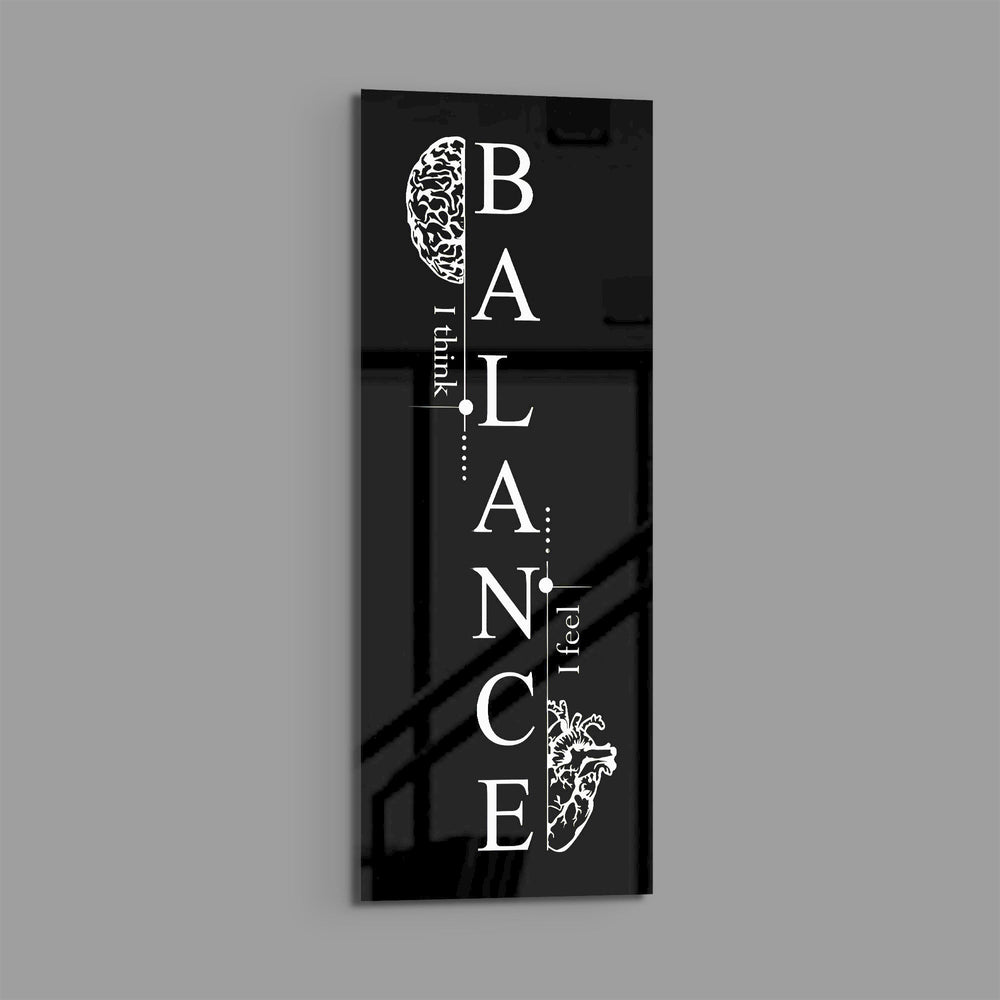 Monochrome motivational typography panel spelling the word balance vertically, flanked by a line-drawn brain and an anatomical heart. panoramic glass wall art E