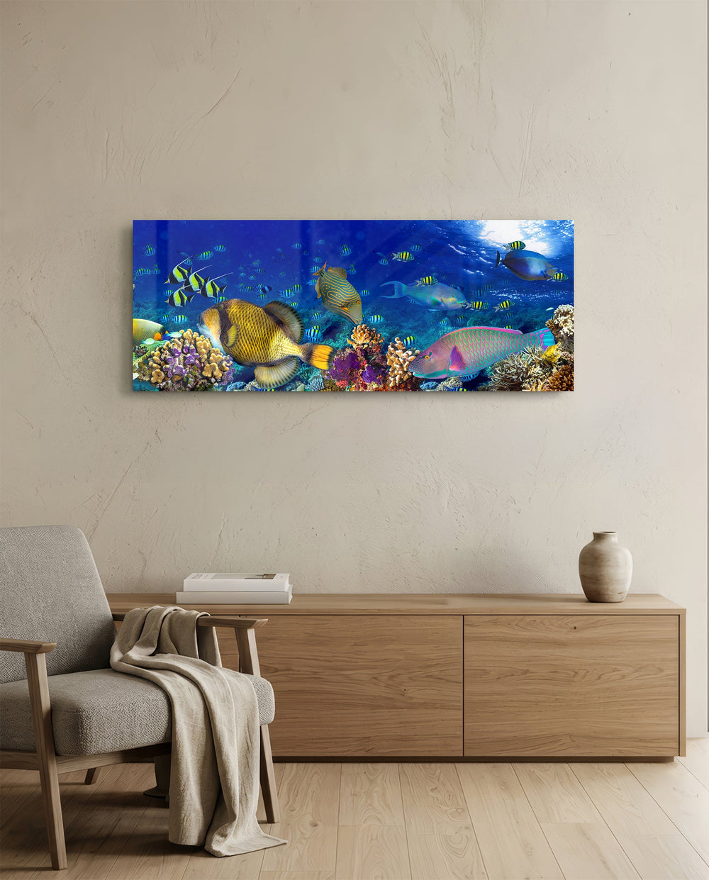 Vivid underwater panorama of a tropical coral reef alive with colorful fish, sunlight rippling through deep blue water. panoramic glass wall art A