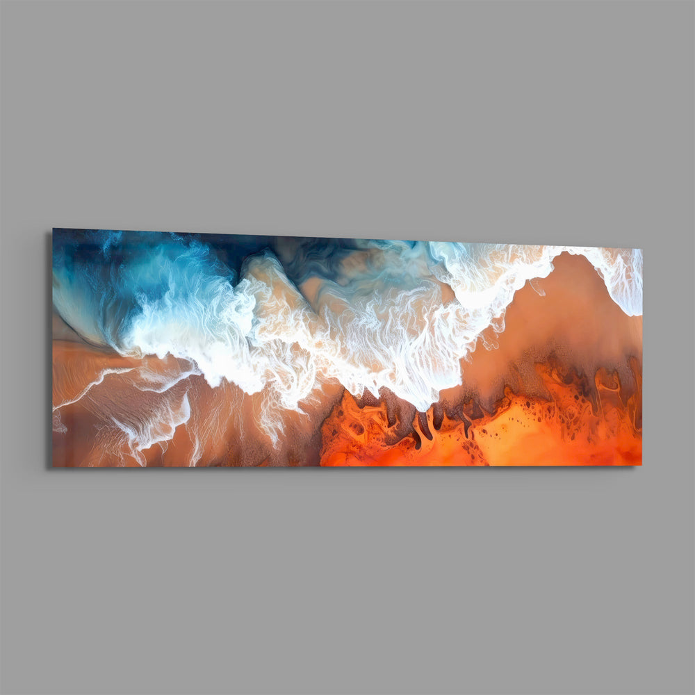 An aerial-style abstract fluid artwork of turquoise sea meeting coral-orange sand with lacy white foam. panoramic glass wall art E