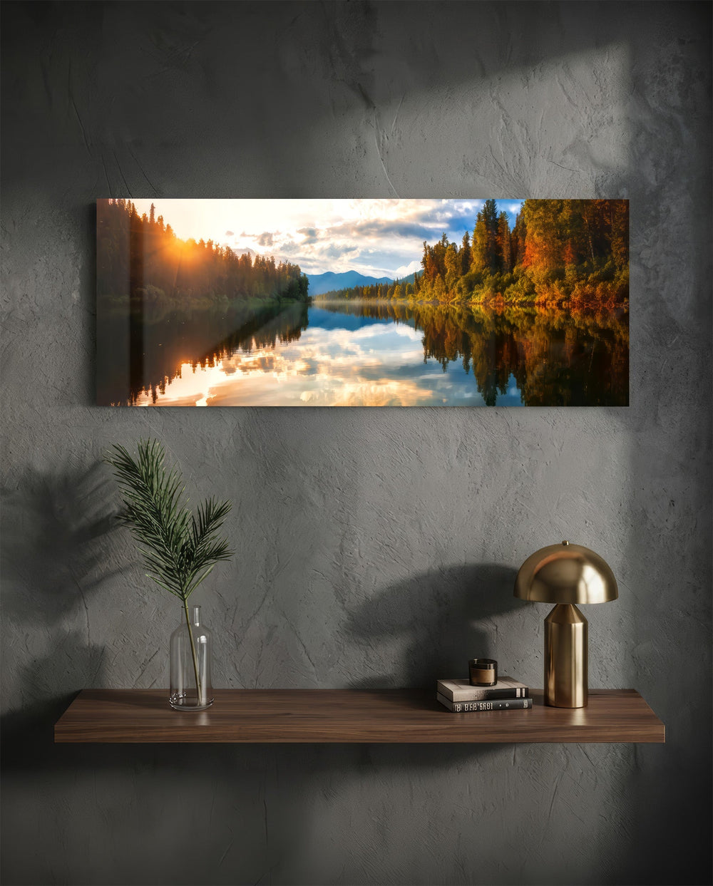 A mirror-calm lake at sunrise reflecting autumn forest, distant mountains, and a glowing cloudy sky. panoramic glass wall art D