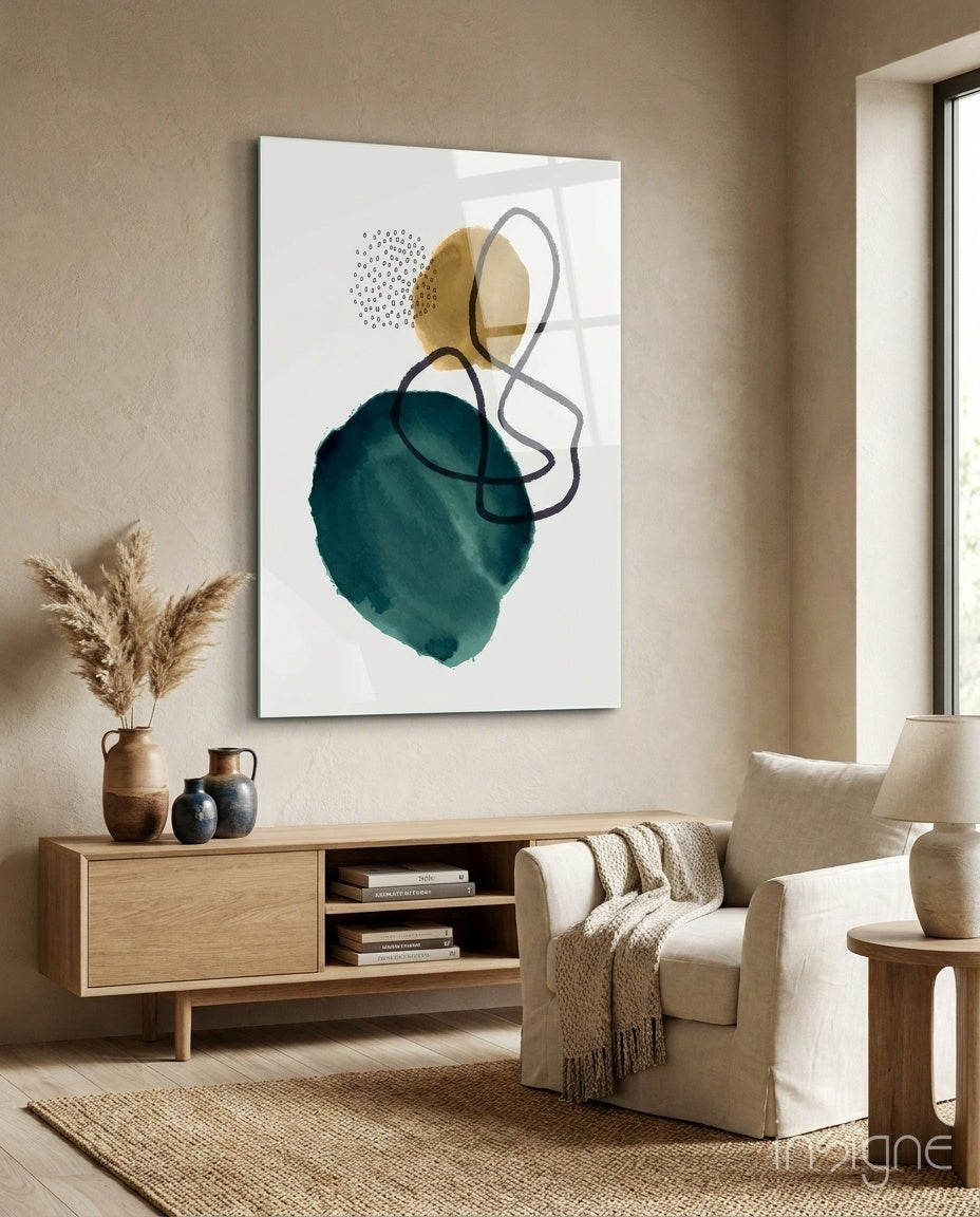 Teal Stack glass wall art displayed above a wood credenza in a warm minimalist living room