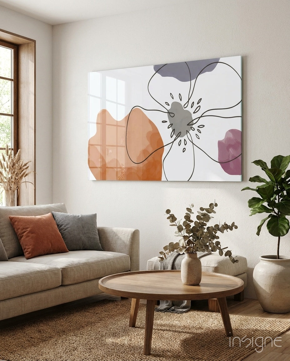 Scandi Bloom glass wall art displayed above a linen sofa in a warm minimalist living room