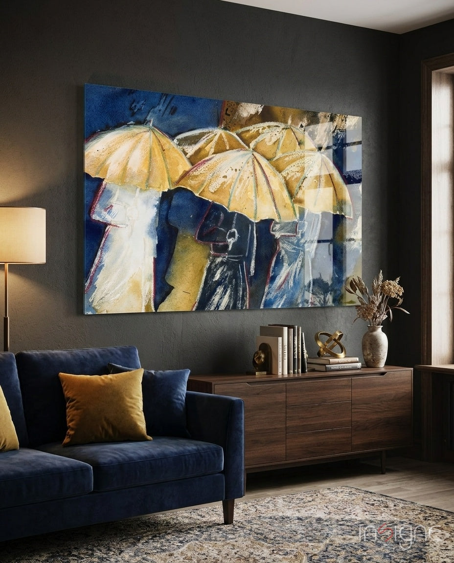 Yellow Umbrellas glass wall art displayed above a walnut credenza in a charcoal-walled lounge with navy velvet sofa