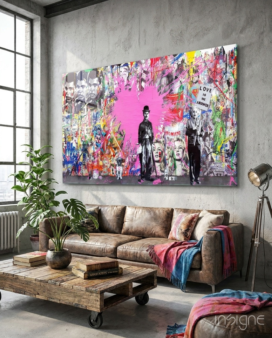 Cinema Pop glass wall art displayed above a brown leather sofa in an industrial concrete-walled lounge