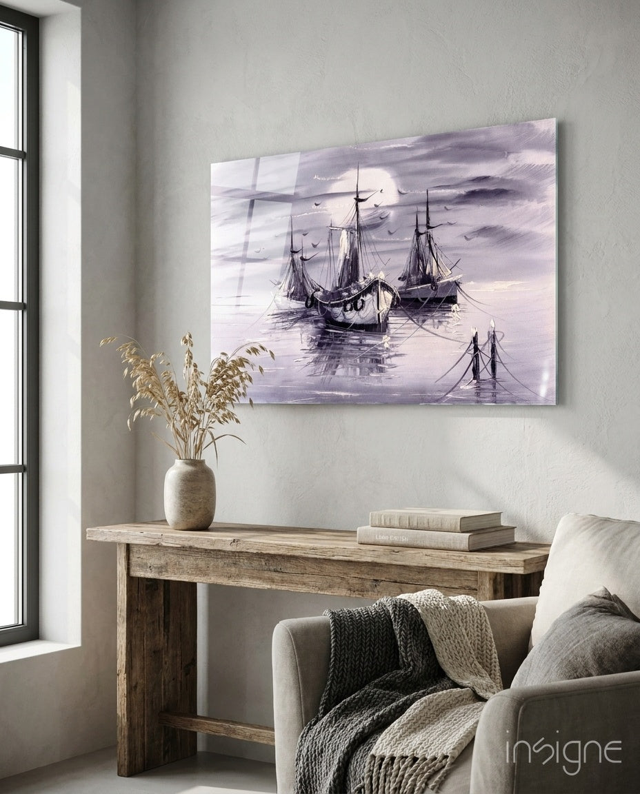 Moonlit Fleet glass wall art displayed above a wood console in a warm minimalist nook with linen armchair