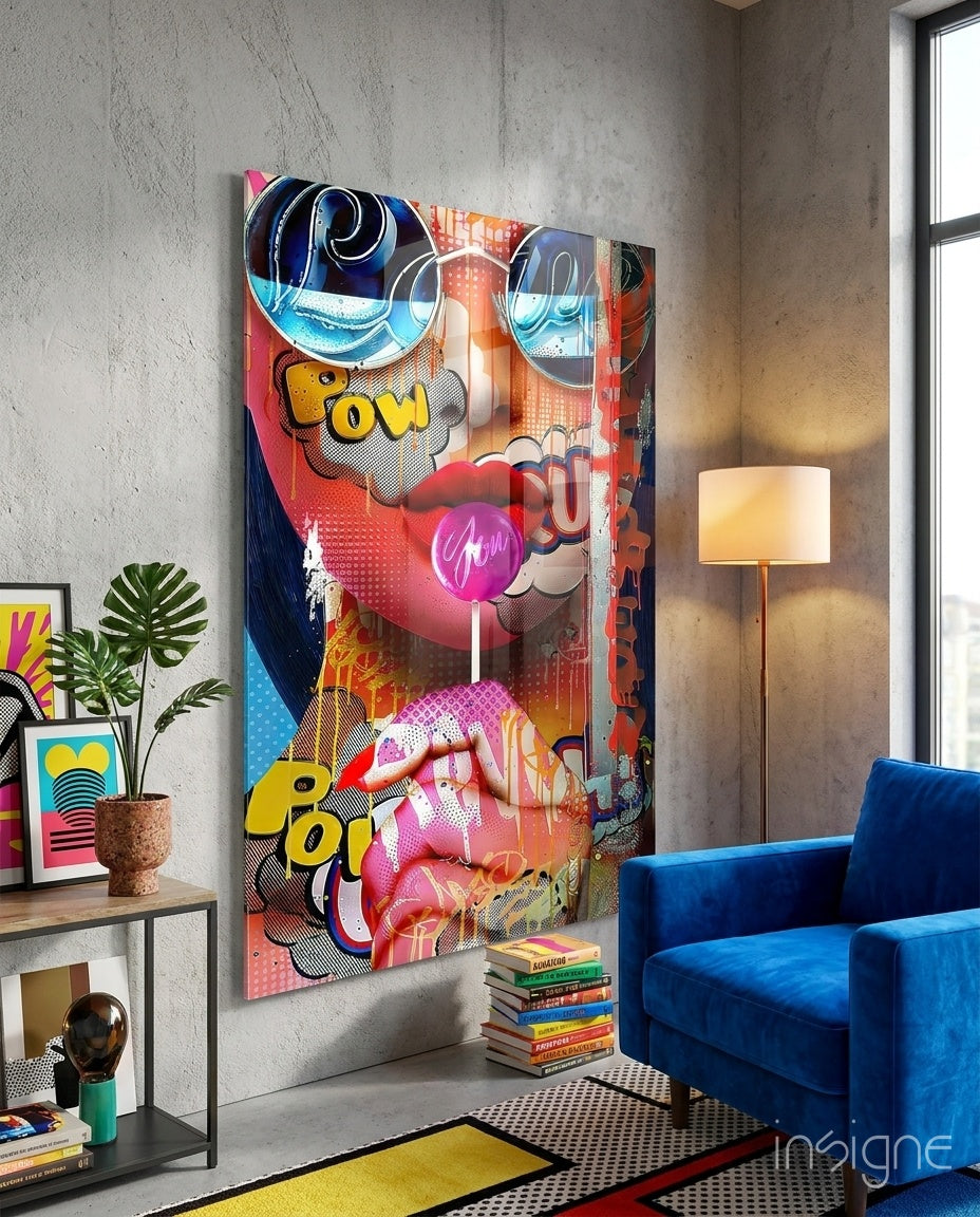 Bubblegum Pop glass wall art displayed above a wood console in an industrial concrete-walled lounge with cobalt velvet armchair