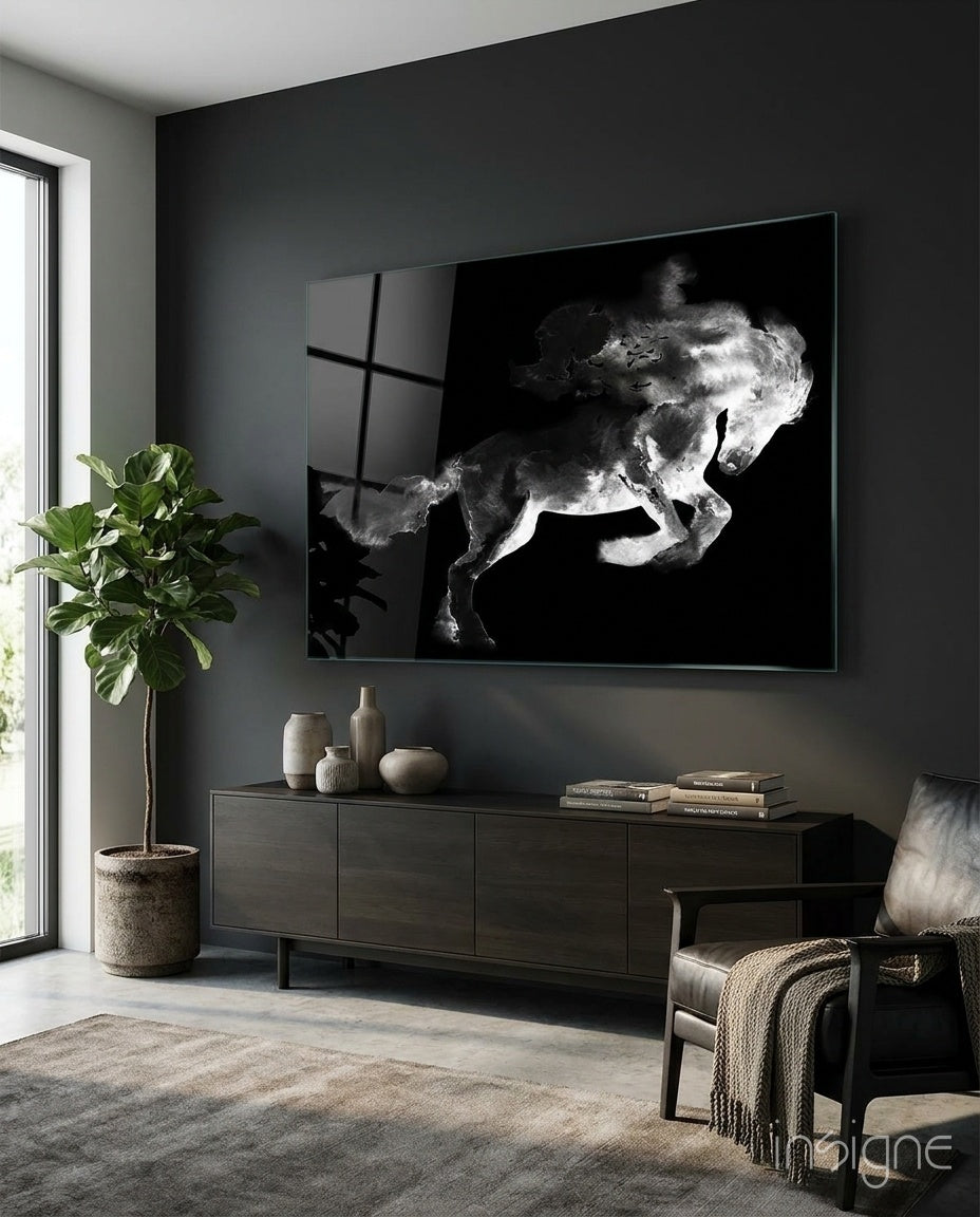 Horse glass wall art displayed above a dark wood credenza in a moody charcoal-walled lounge with leather armchair and fiddle leaf fig