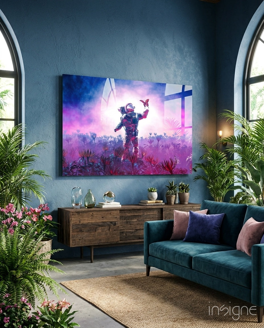 Land of Butterflies glass wall art displayed above a walnut credenza in a teal-walled lounge with arched windows and ferns