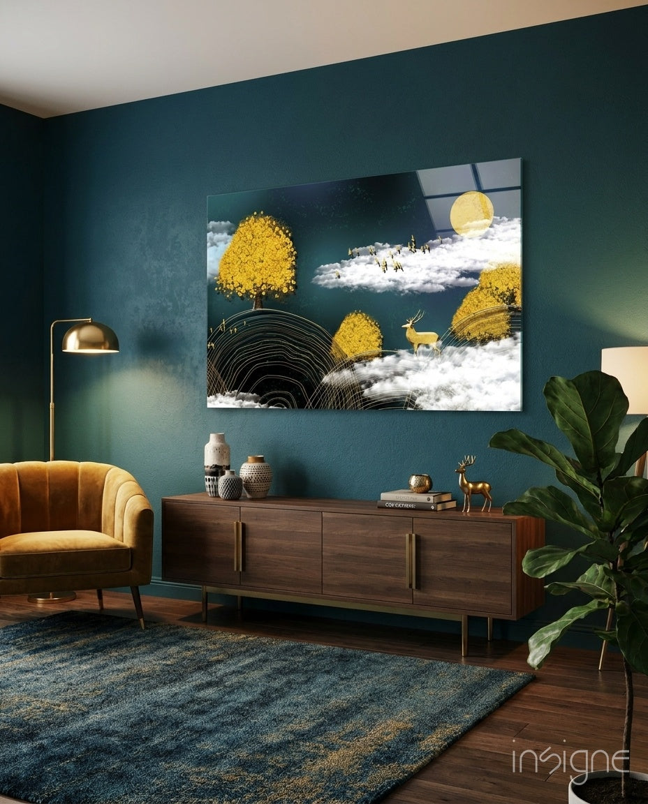 Abstraction glass wall art displayed above a walnut credenza in a teal-walled lounge with mustard velvet armchair and fiddle leaf fig