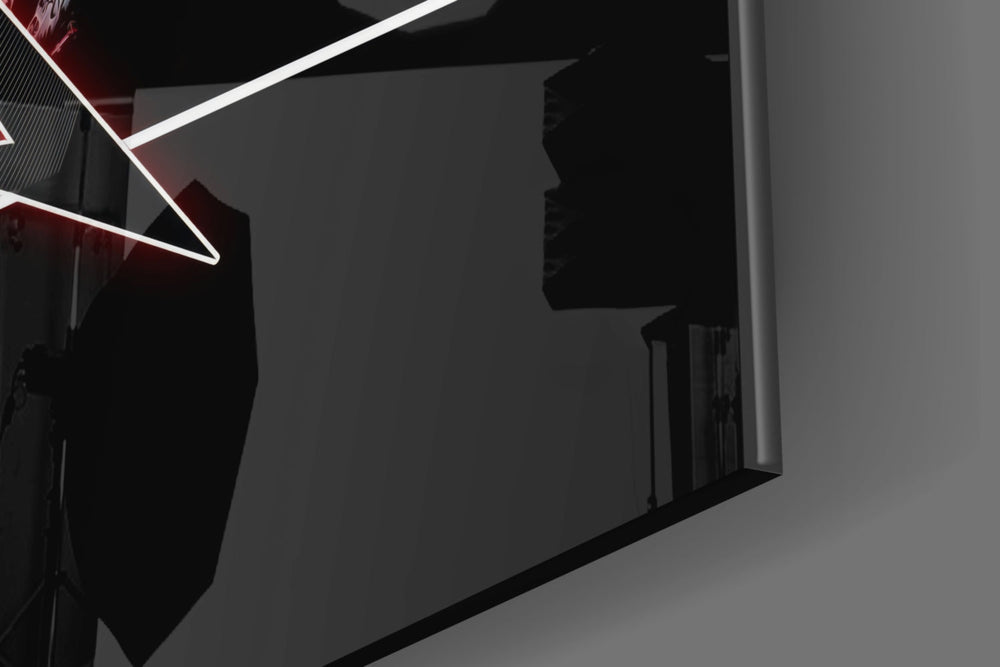 Metallica glass wall art styled above a console in a hallway