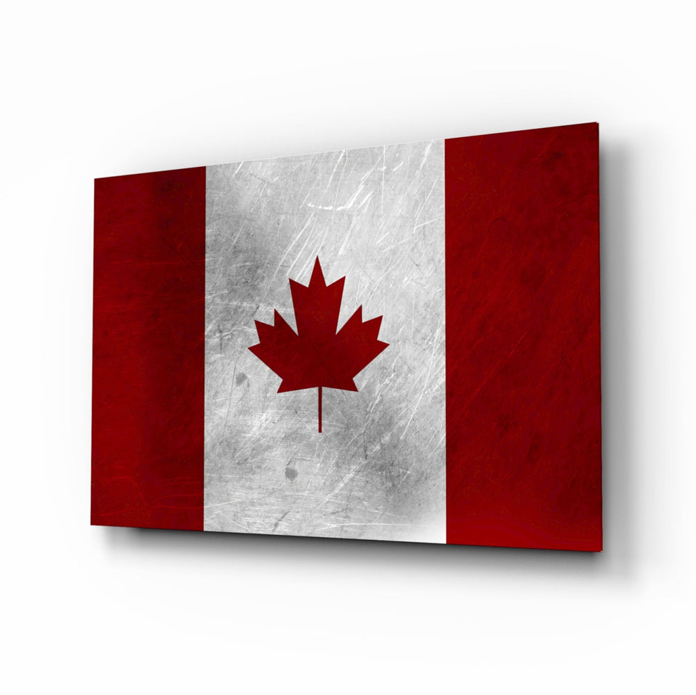 Flag of Canada Flag glass wall art displayed above a leather chesterfield in a Canadiana lounge with reclaimed-wood console and brass picture light