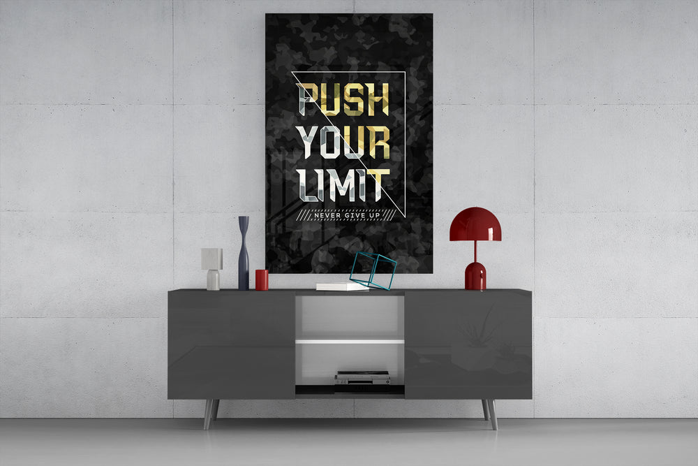 Push Your Limit glass wall art catching light to reveal its gold-camo facets