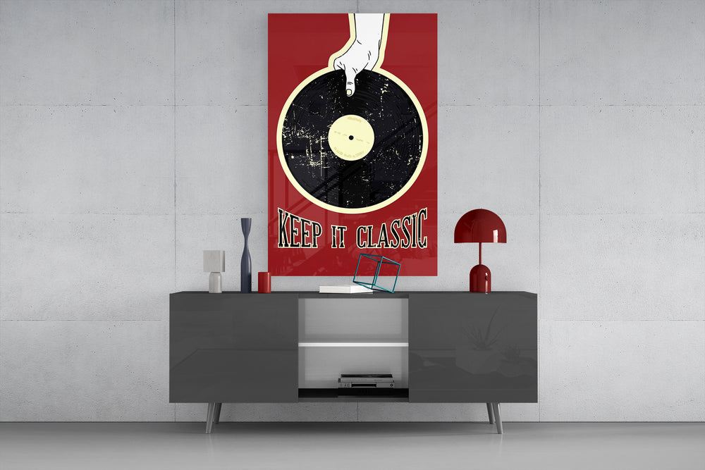 Keep It Classic glass wall art catching light to reveal its poster texture