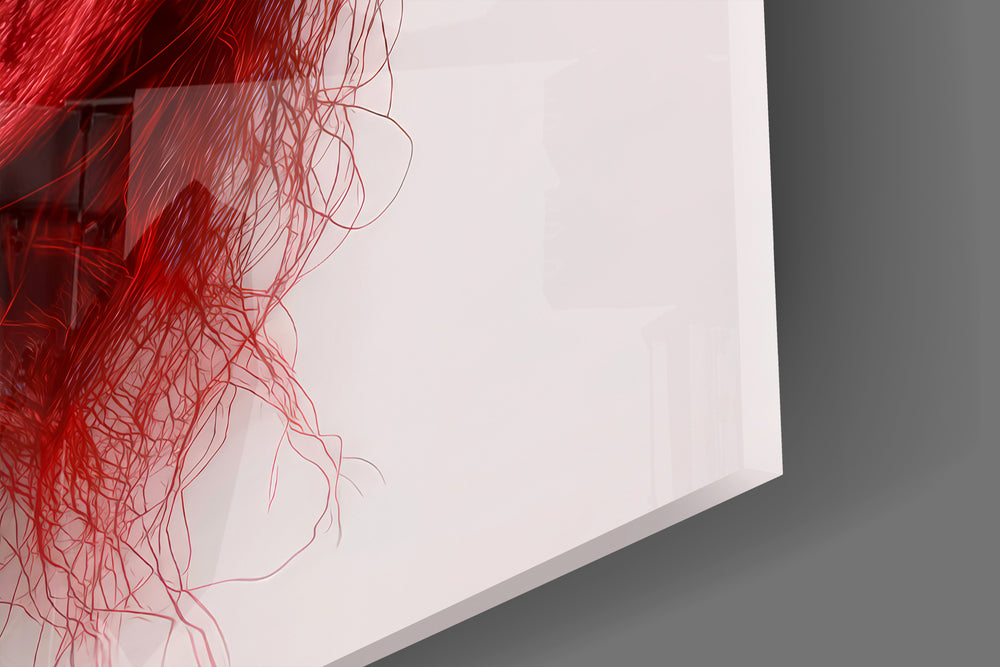 Close-up detail of the graphite face peeling into red skull behind glass