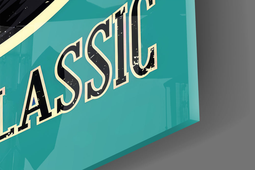 Close-up detail of the worn black vinyl on teal background behind glass