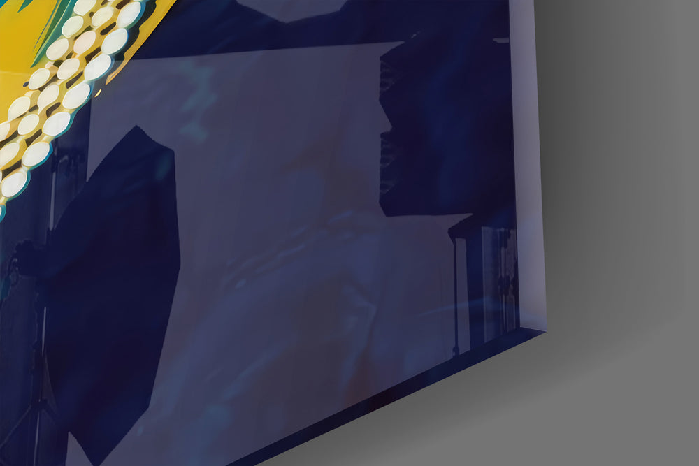 Close-up detail of the pop-vector queen and tongue logo behind glass