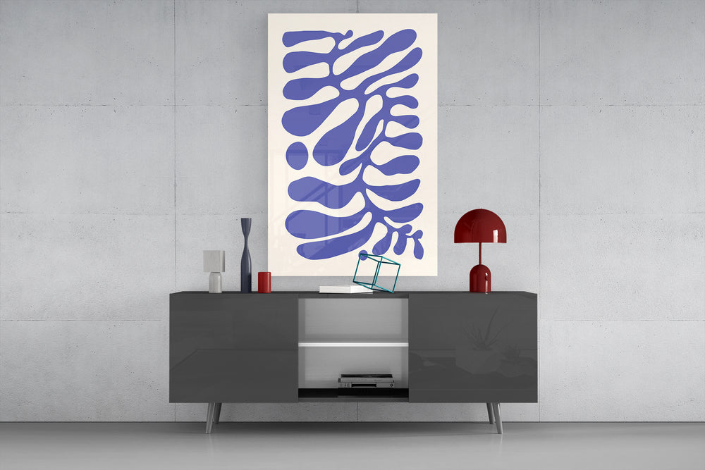 Periwinkle abstract glass wall art catching light to reveal its flat-color cuts