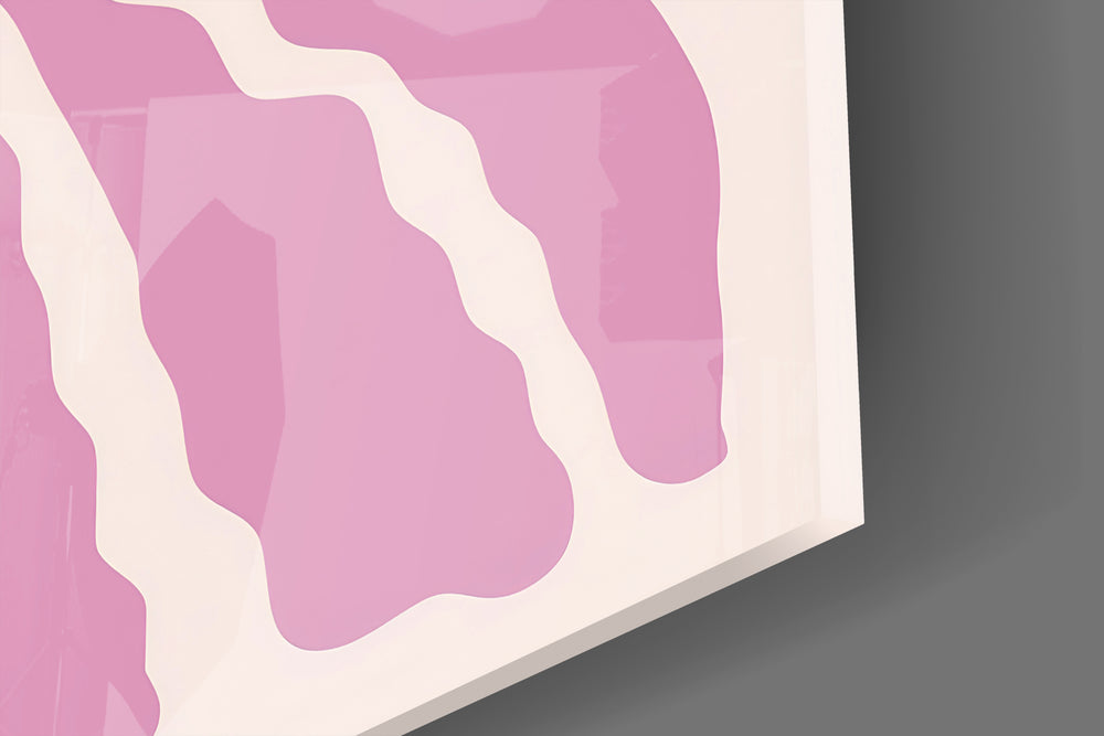 Close-up detail of the magenta heart and pink sunburst rays behind glass