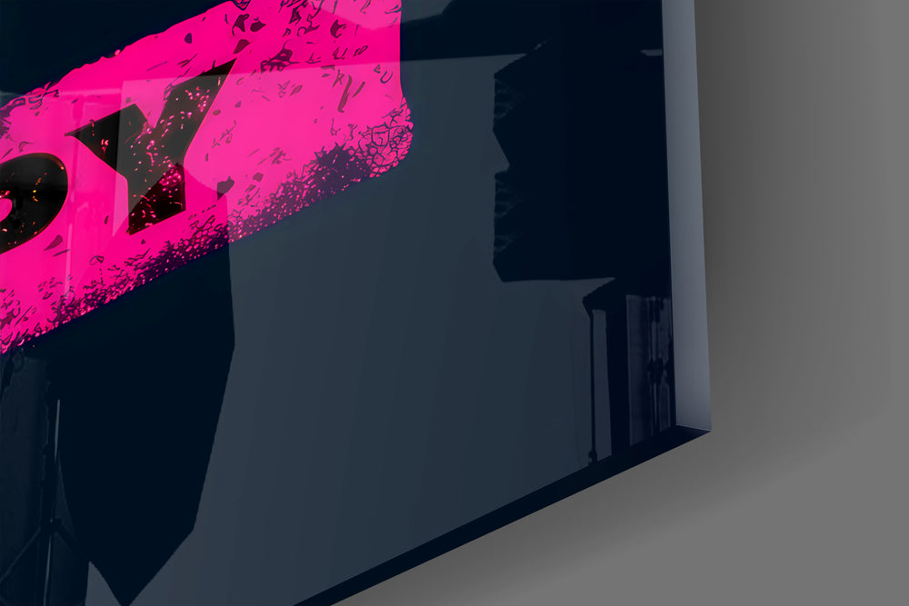Close-up detail of the distressed color swatches and black sans-serif behind glass