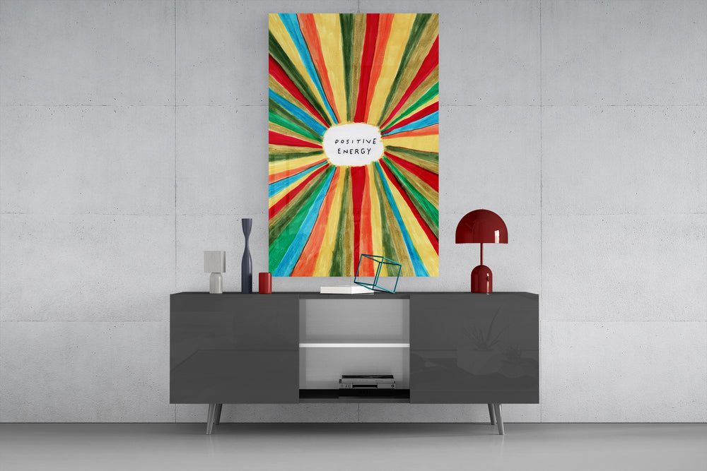 Positive Energy glass wall art catching light to reveal its painted brushwork