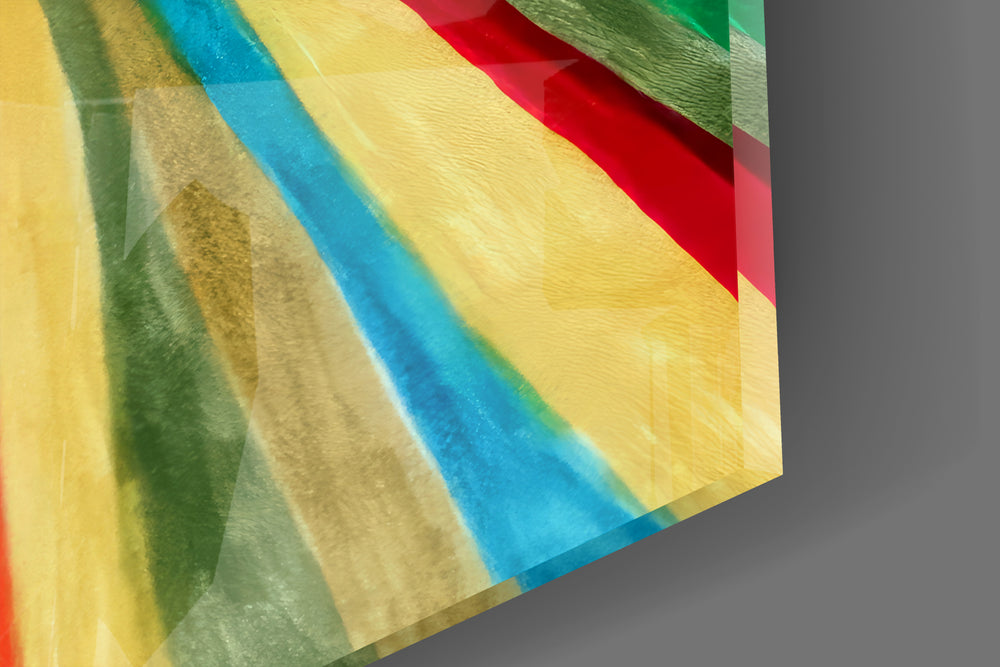 Close-up detail of the brushed rainbow rays and cream center behind glass