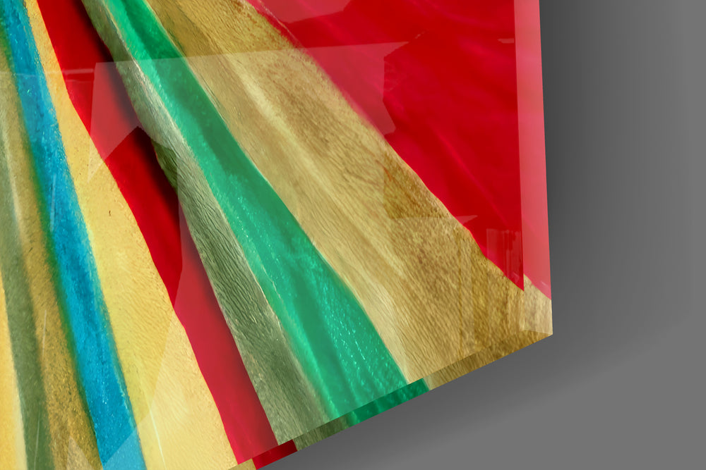 Close-up detail of the brushed rainbow rays and cream center behind glass