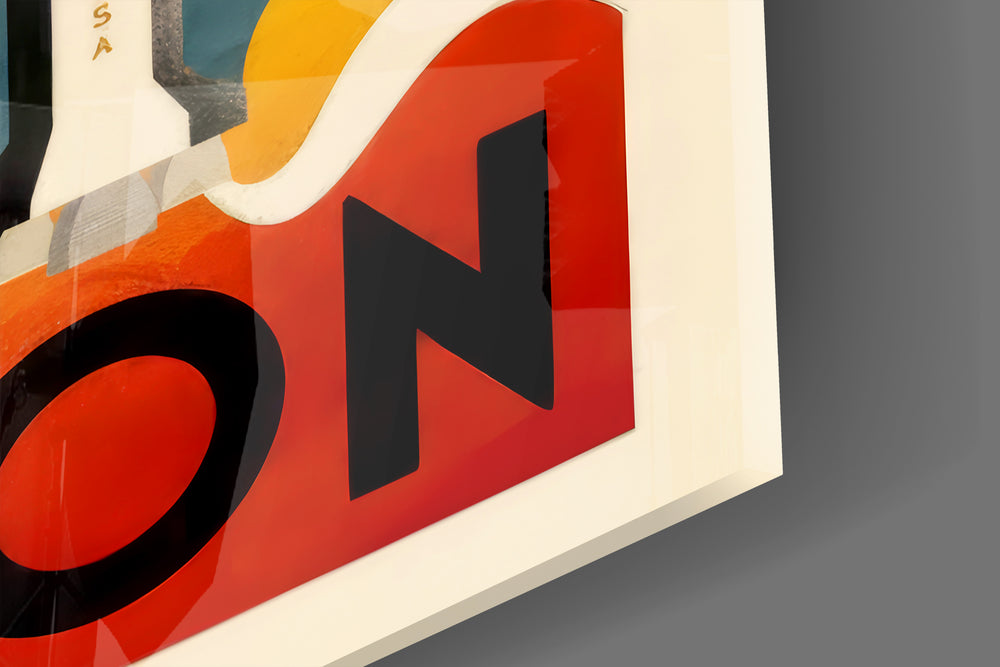 Close-up detail of the rocket launch and flame typography behind glass