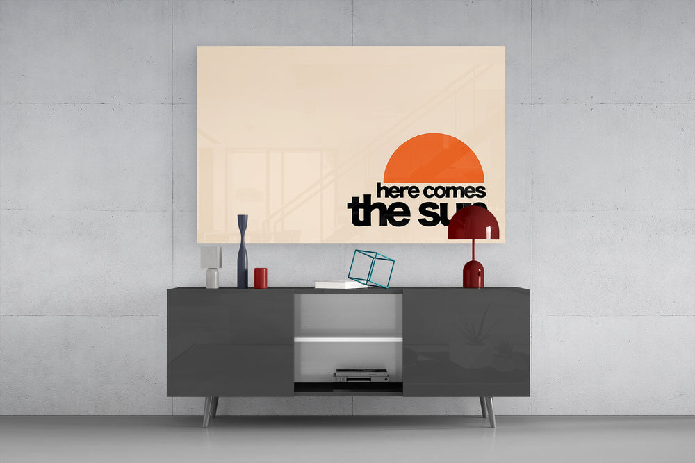 Here Comes The Sun wide glass wall art catching light to reveal its graphic clarity