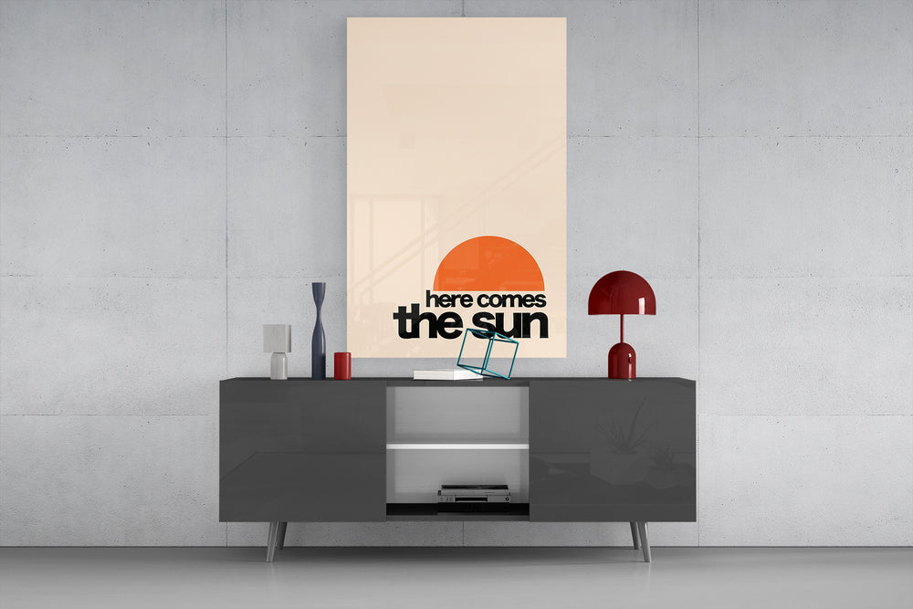Here Comes The Sun vertical glass wall art catching light to reveal its graphic clarity
