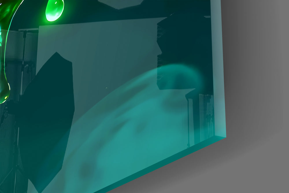 Close-up detail of the scarlet apple and green skull face behind glass
