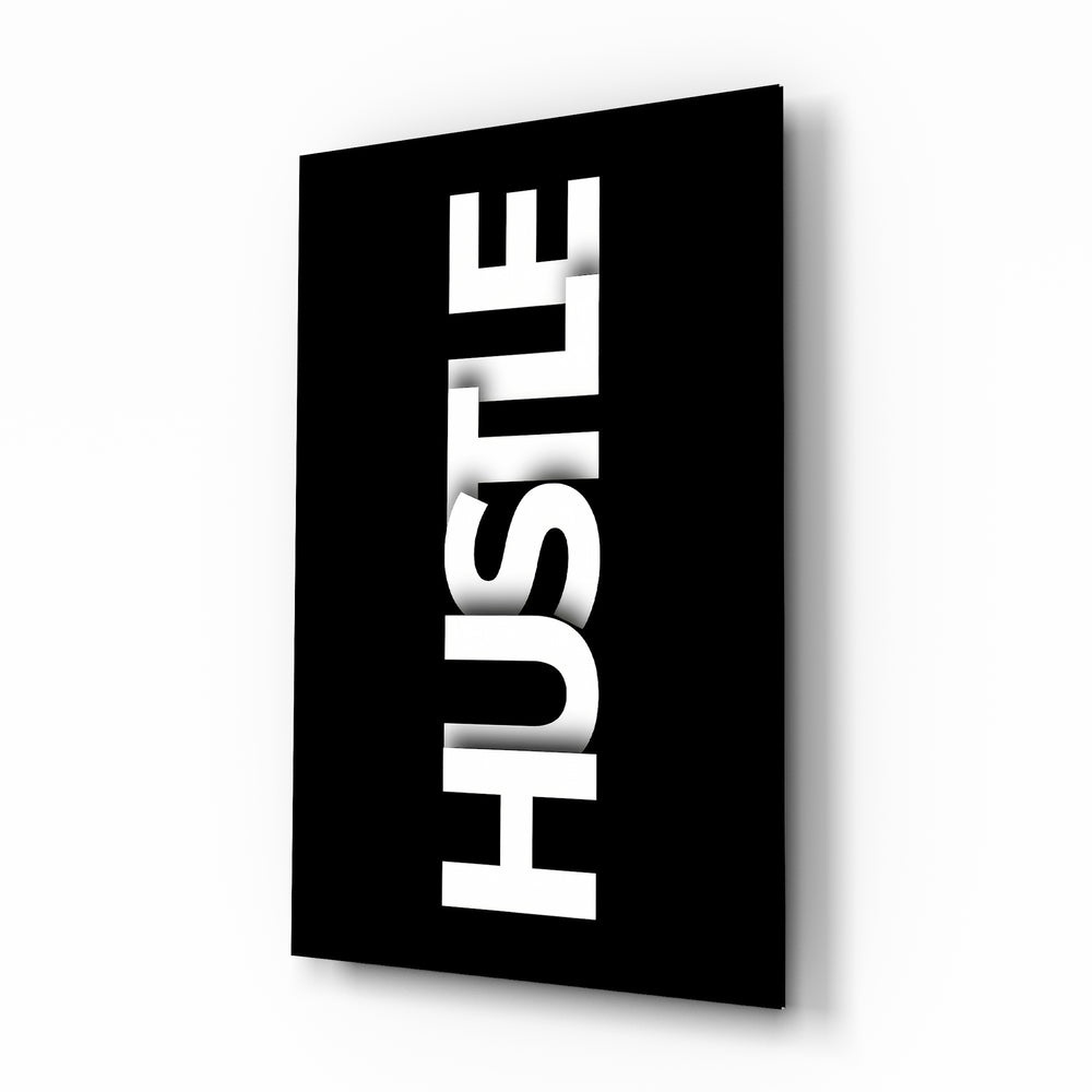 Hustle minimalist typography glass wall art in a modern executive office