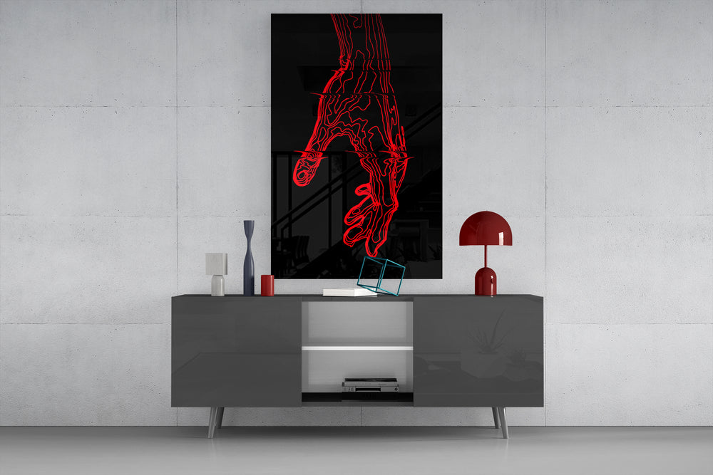Red Hand Outline glass wall art catching light to reveal its drawn precision