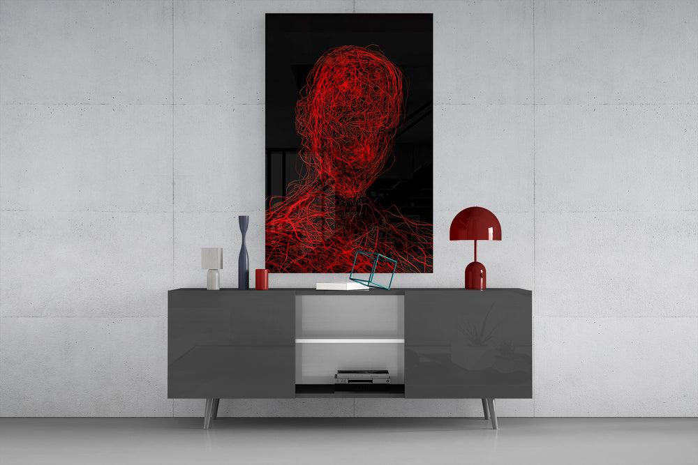 Red Tangle Portrait glass wall art catching light to reveal its threaded line work