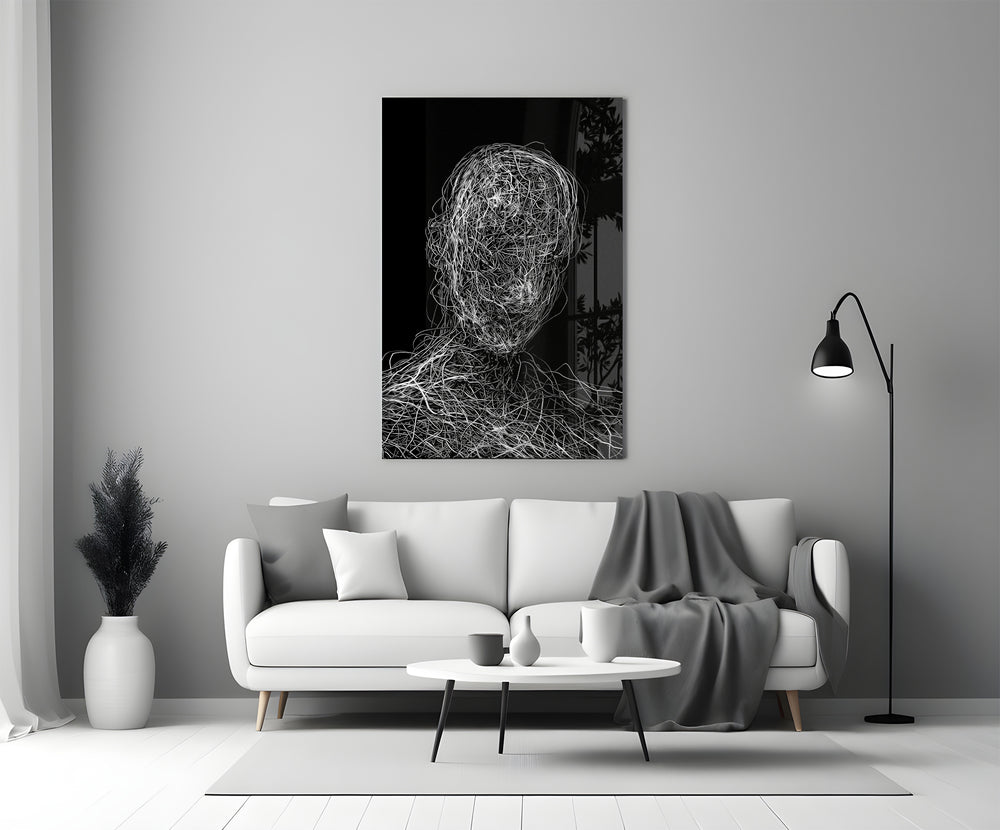 Line-art glass print bringing reflective mood to a creative loft
