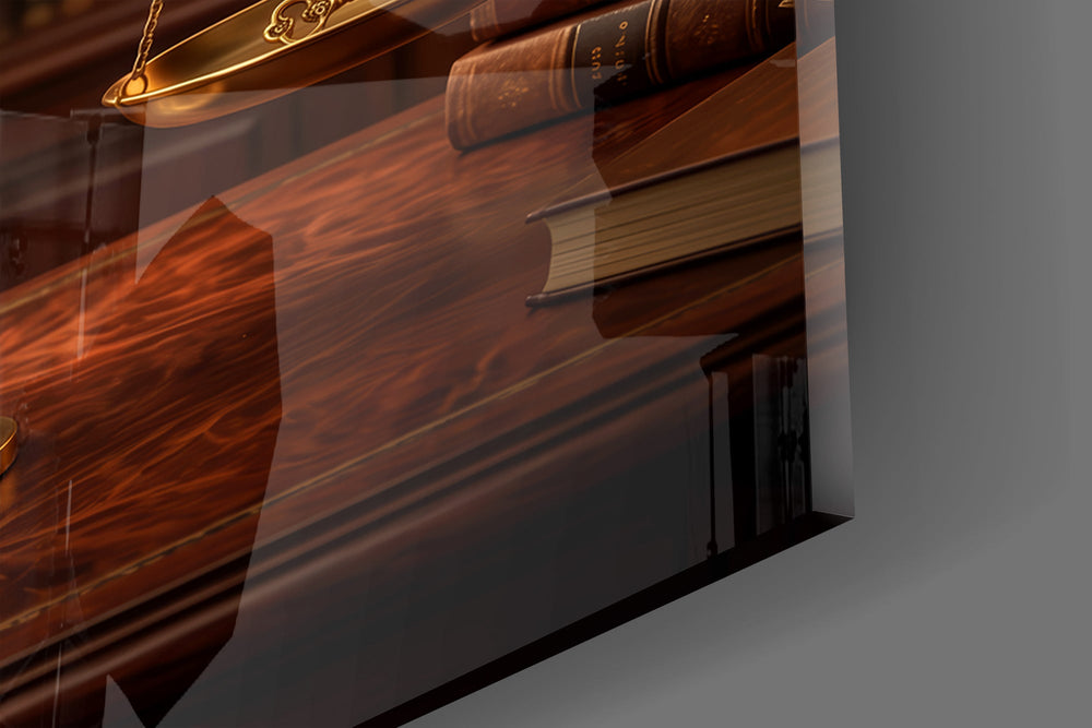 Close-up detail of the brass scale pans and mahogany desk on the glass surface