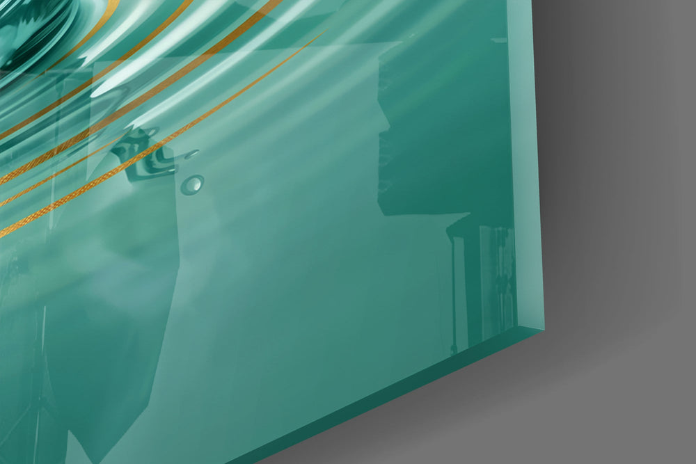 Close-up detail of the gilded lotus petals and the rippling teal water crown on the glass surface