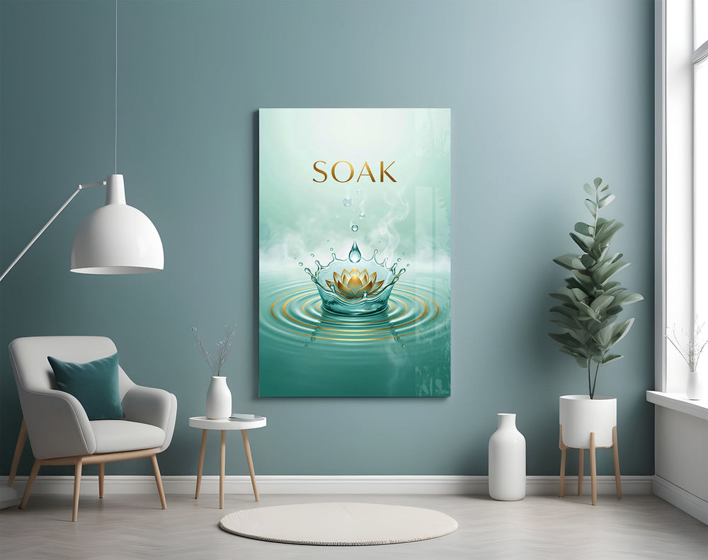 soak golden lotus water crown glass wall art styled above an armchair in a reading corner
