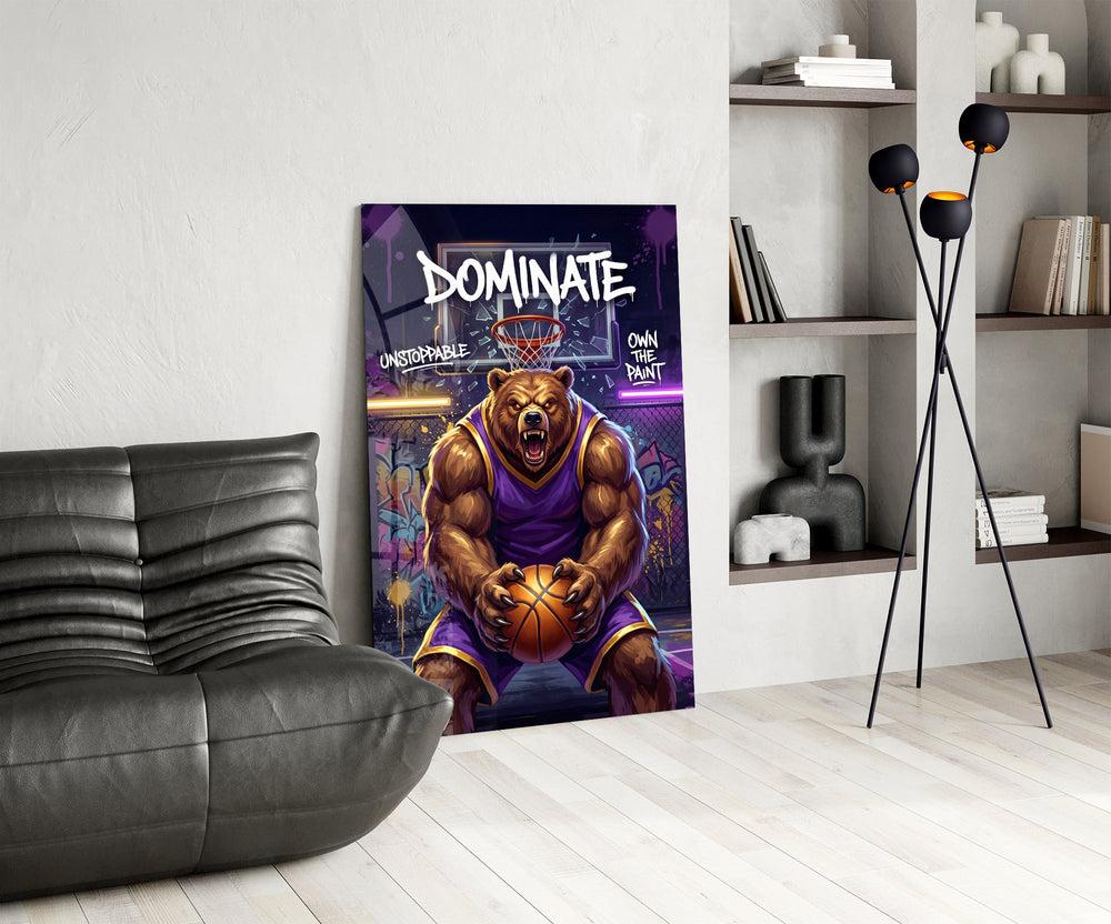 dominate grizzly bear baller glass wall art leaning beside a dark leather sofa