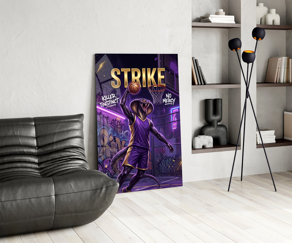 strike cobra baller slam dunk glass wall art leaning beside a dark leather sofa