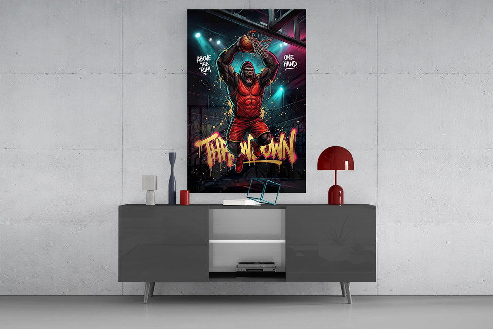 gorilla basketball player dunking one-handed glass wall art displayed above a console in a designer interior