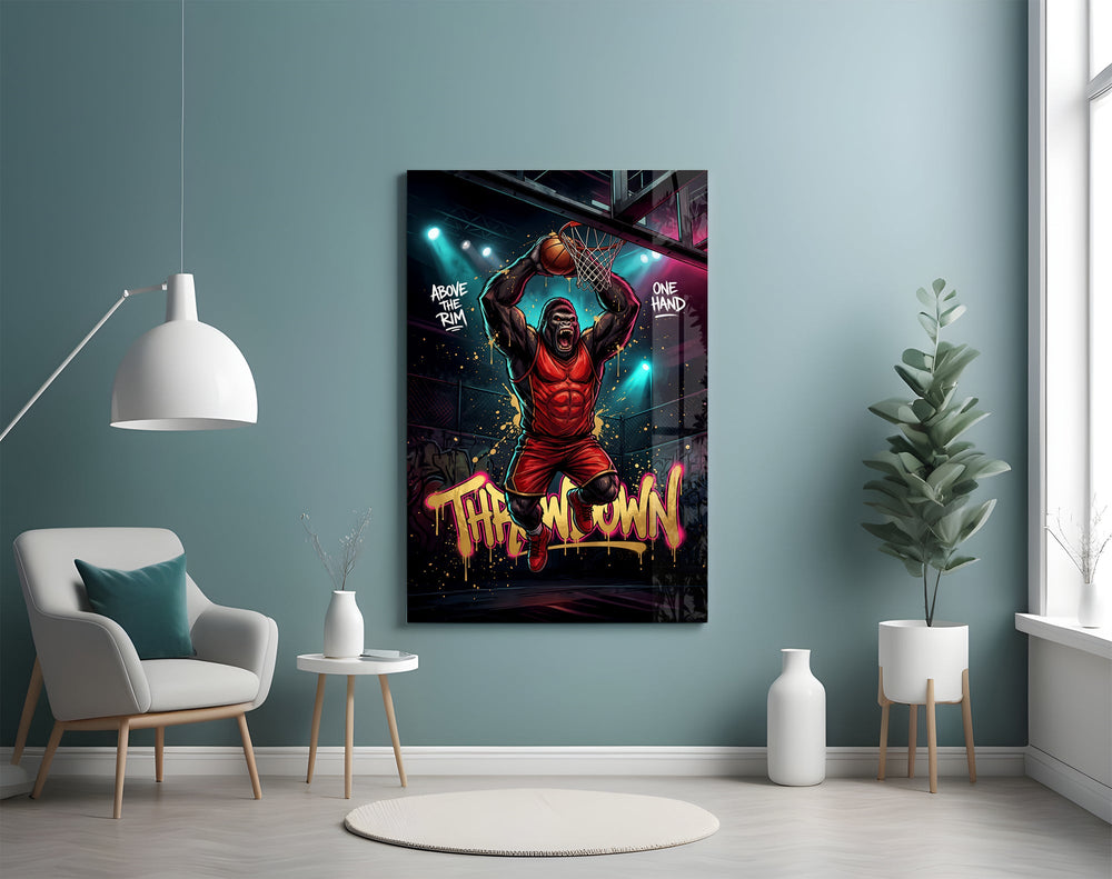 gorilla basketball player dunking one-handed glass wall art styled above an armchair in a reading corner