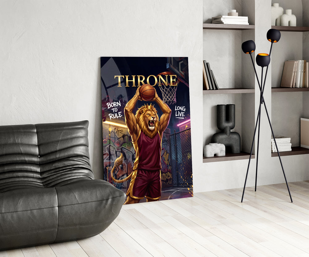 crowned lion basketball player shooting glass wall art leaning beside a dark leather sofa