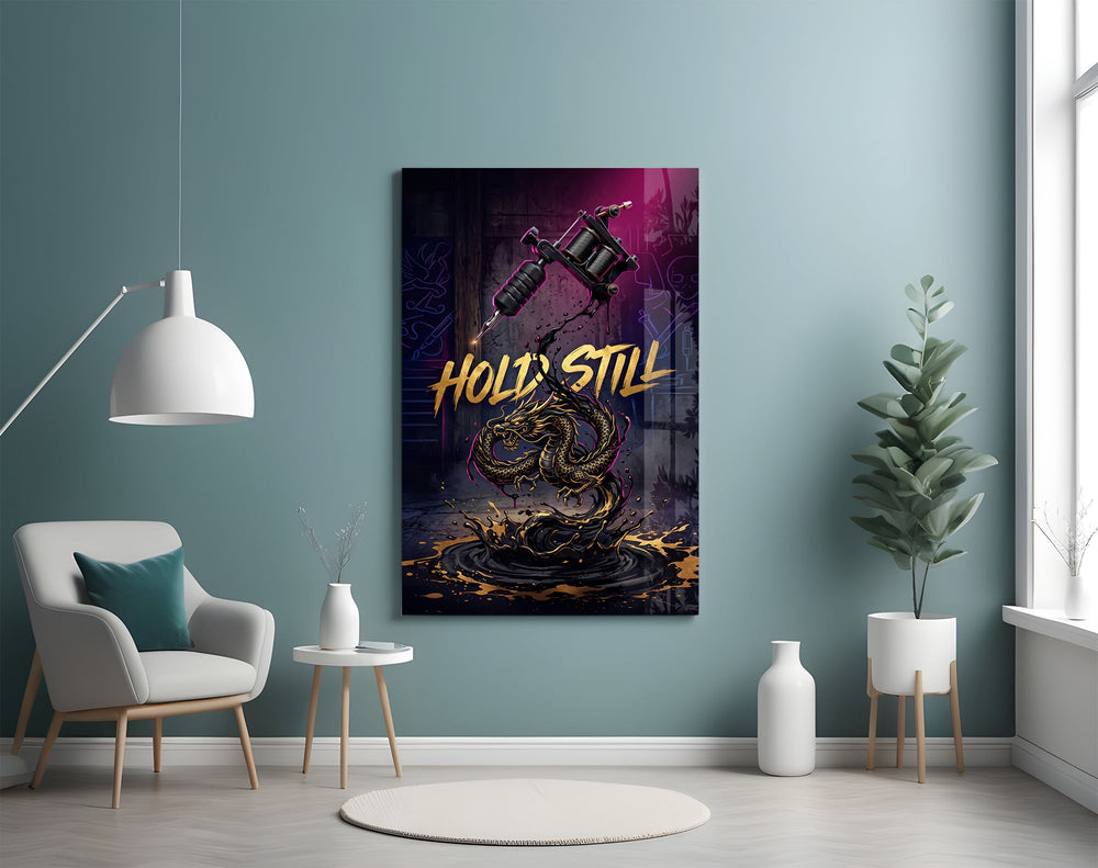 hold still tattoo machine and gold dragon glass wall art styled above an armchair in a reading corner