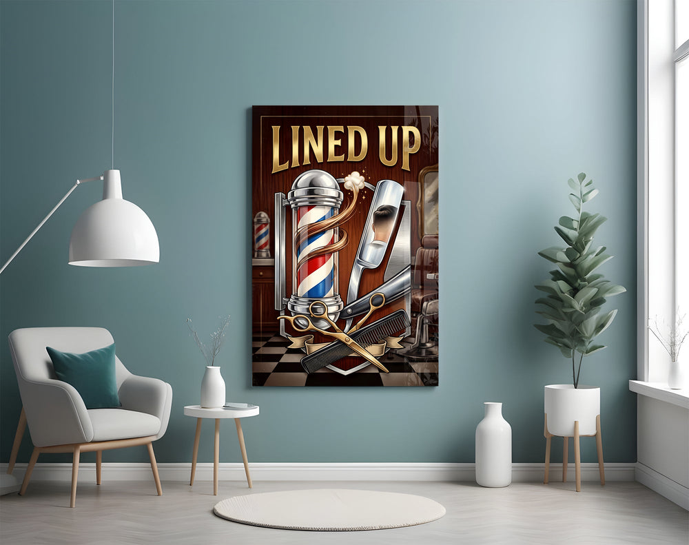 lined up vintage barbershop emblem glass wall art styled above an armchair in a reading corner