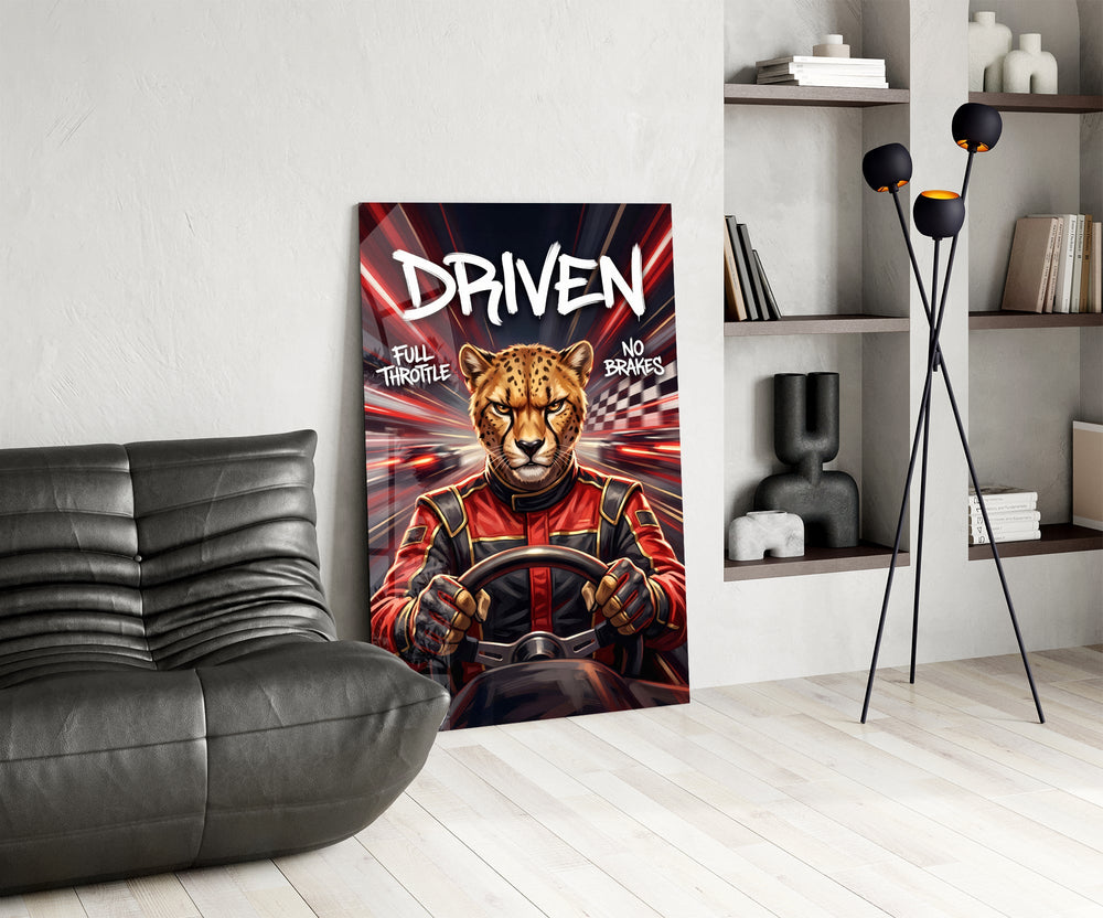 driven cheetah race car driver glass wall art leaning beside a dark leather sofa