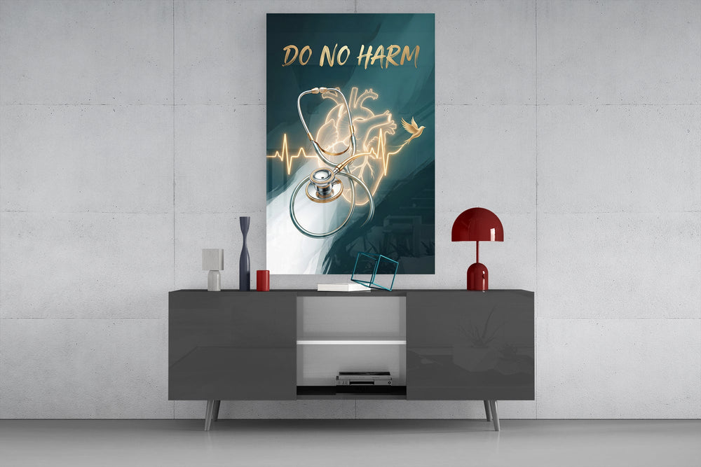 do no harm stethoscope and golden heart glass wall art displayed above a console in a designer interior