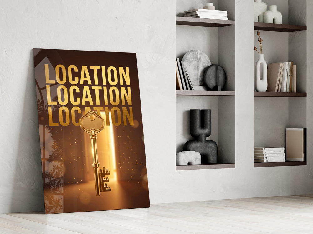 gold real estate key with a skyline panel resting in a shelving niche in a modern interior