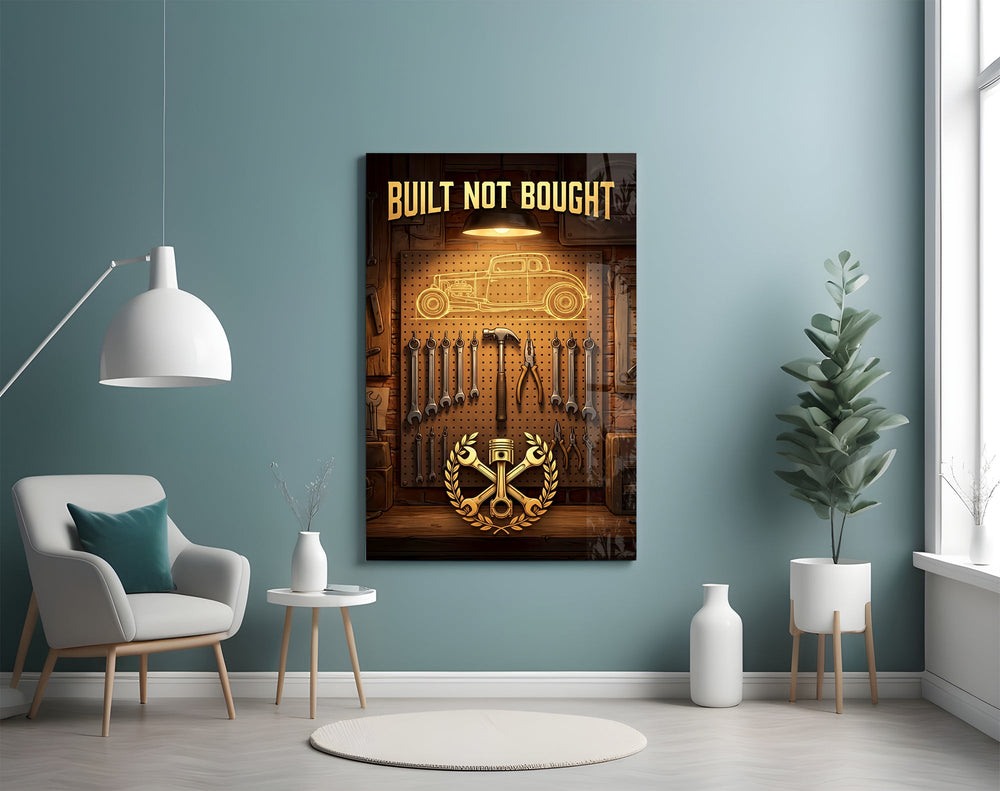 hot rod garage tool wall glass wall art styled above an armchair in a reading corner