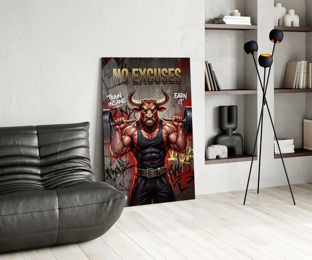 a weightlifting bull with a barbell glass wall art leaning beside a dark leather sofa