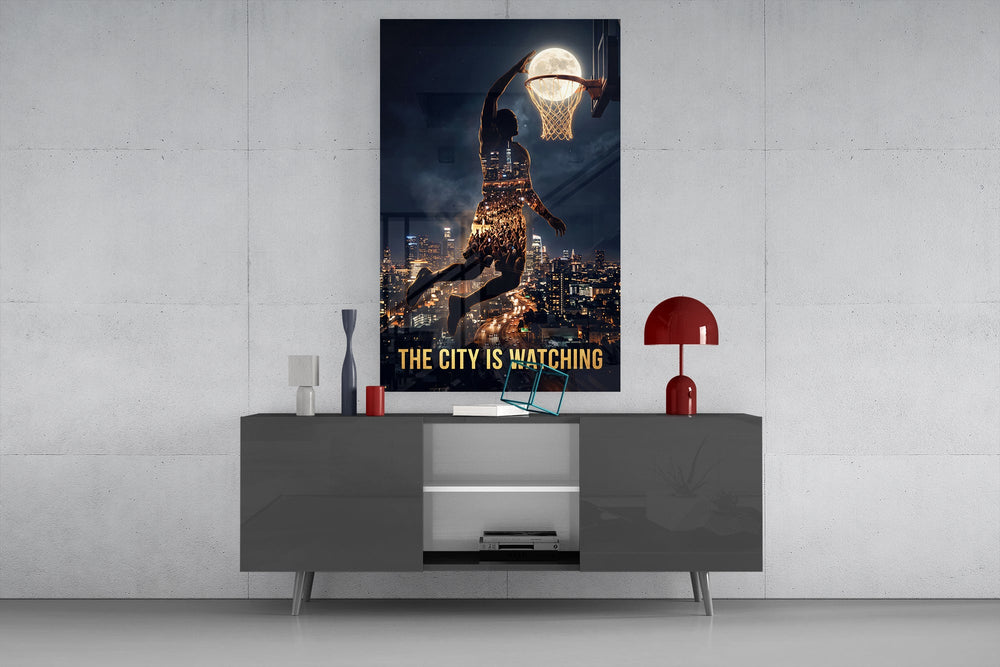 the city is watching moonlit dunk glass wall art displayed above a console in a designer interior